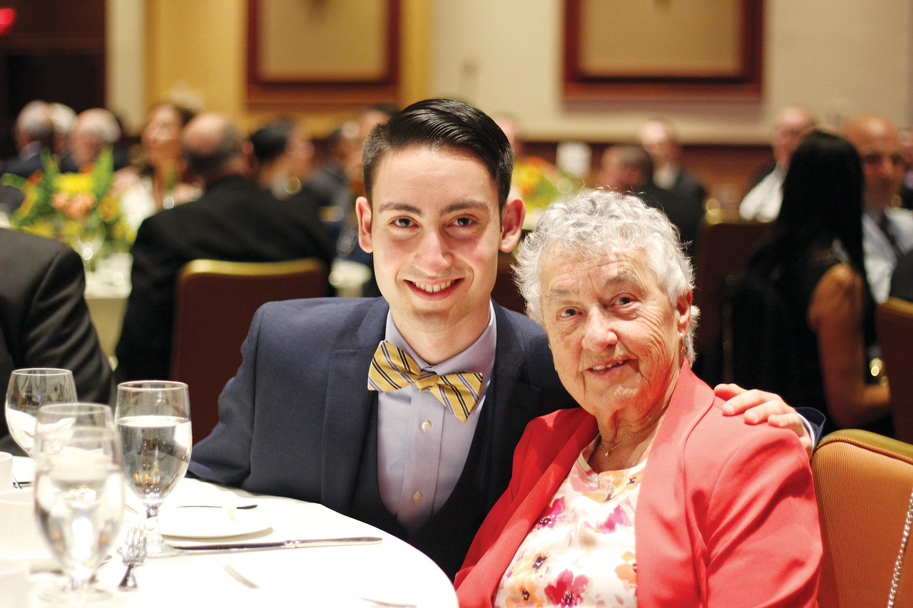 Noah DaSilva, 17, smiles with his grandmother Josephine, who he said played an important role in his faith formation.
