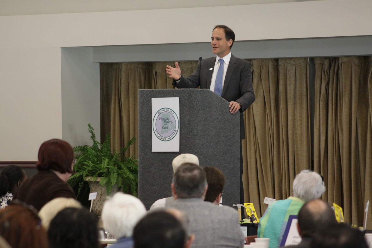 UNITED FOR JUSTICE: Keynote speaker Rabbi Jonah Pesner, director of the Religious Action Center for Reform Judaism, addresses the crowd at the eighth annual Interfaith Poverty Conference hosted by the Rhode Island Interfaith Coalition to Reduce Poverty on May 11. Rabbi Pesner spoke about the importance of creating a united religious coalition to enact political change. “You have laid the foundation to build a powerful and effective movement for justice here,” he said.
