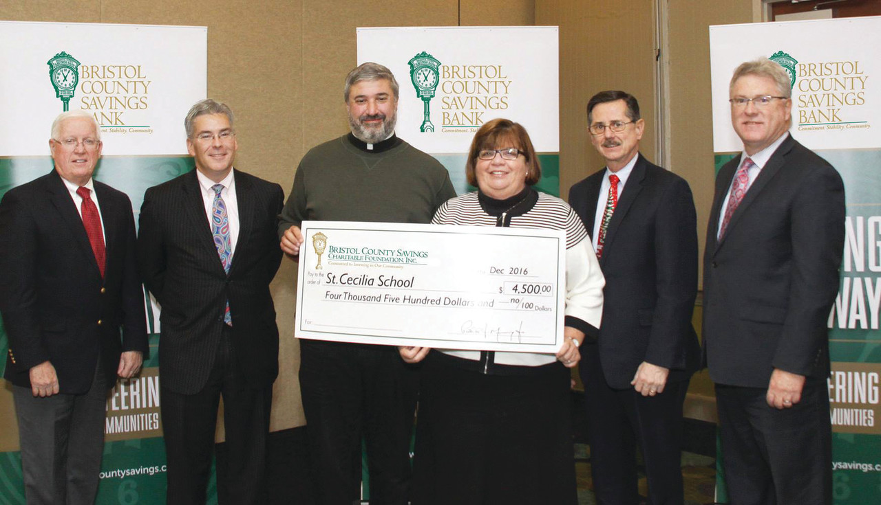 Pictured from left to right are Dennis Kelly, Chairman of the Board, Bristol County Savings Bank and Chairman, Bristol County Savings Charitable Foundation; Dennis Leahy, Executive Vice President, Treasurer and CFO, and Treasurer; Father Michael Sisco and Mary Tetzner, Principal of St. Cecilia’s School; Ken Riley, AVP, BCSB and BCSCF-Pawtucket Advisory Board Member; and Patrick Murray, President and CEO, and President.