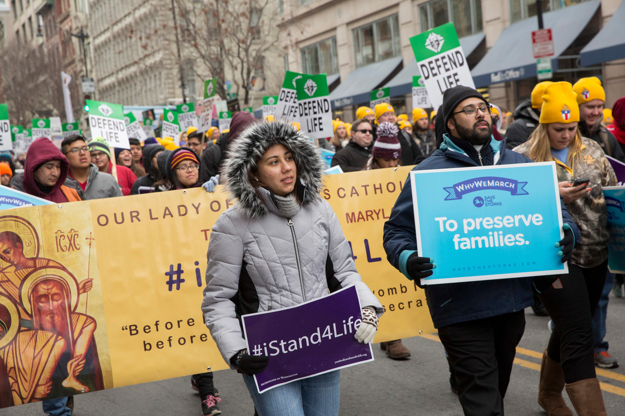 MARCH FOR LIFE: Catholics march during last year’s March for Life in Washington. Rhode Islanders and faithful from around the country are preparing for this year’s march set for Jan. 27, starting near the Washington Monument.