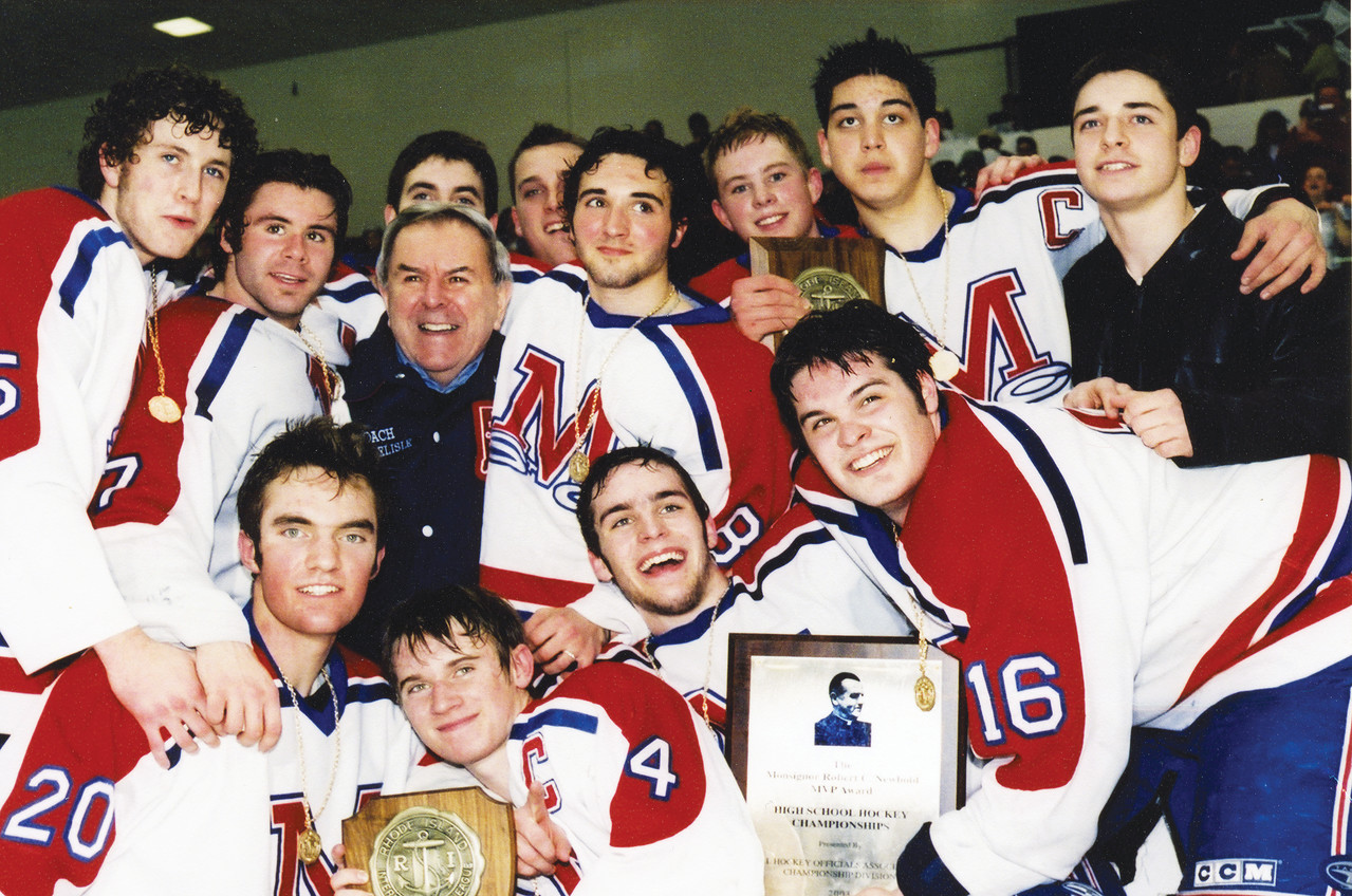 Bill Belisle and his team celebrate after winning the state championship in 2003.
