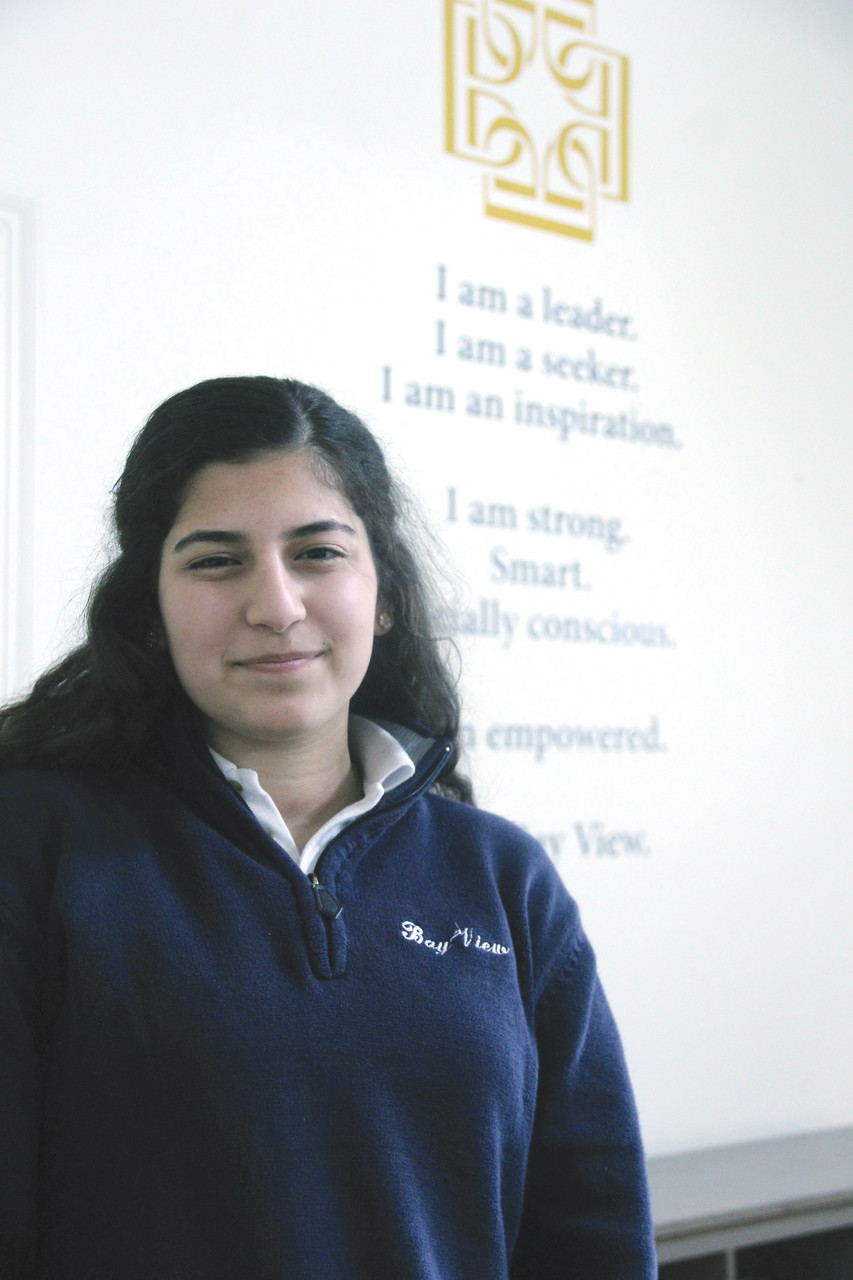 Alyah Achabi, a sophomore at St. Mary Academy - Bay View has lead an schoolwide initiative collecting household supplies for Syrian refugees living in Rhode Island.