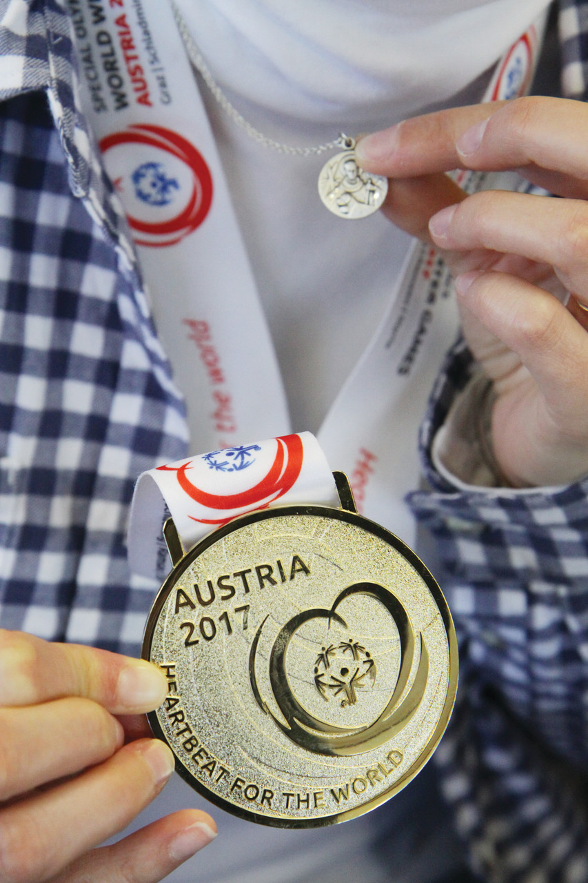 A close-up of Amy’s gold medal, which she’s wearing along with the St. Bernard medal given to her by students and teachers in the program that she wore while competing in Austria.