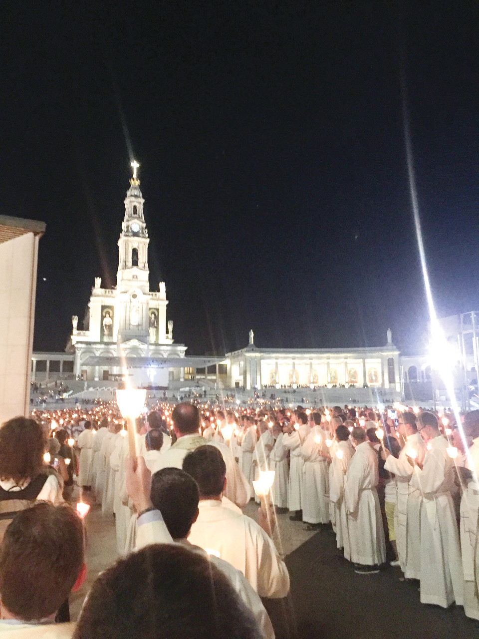 Thousands witness a candlelight vigil at the shrine of Fatima in central Portugal.