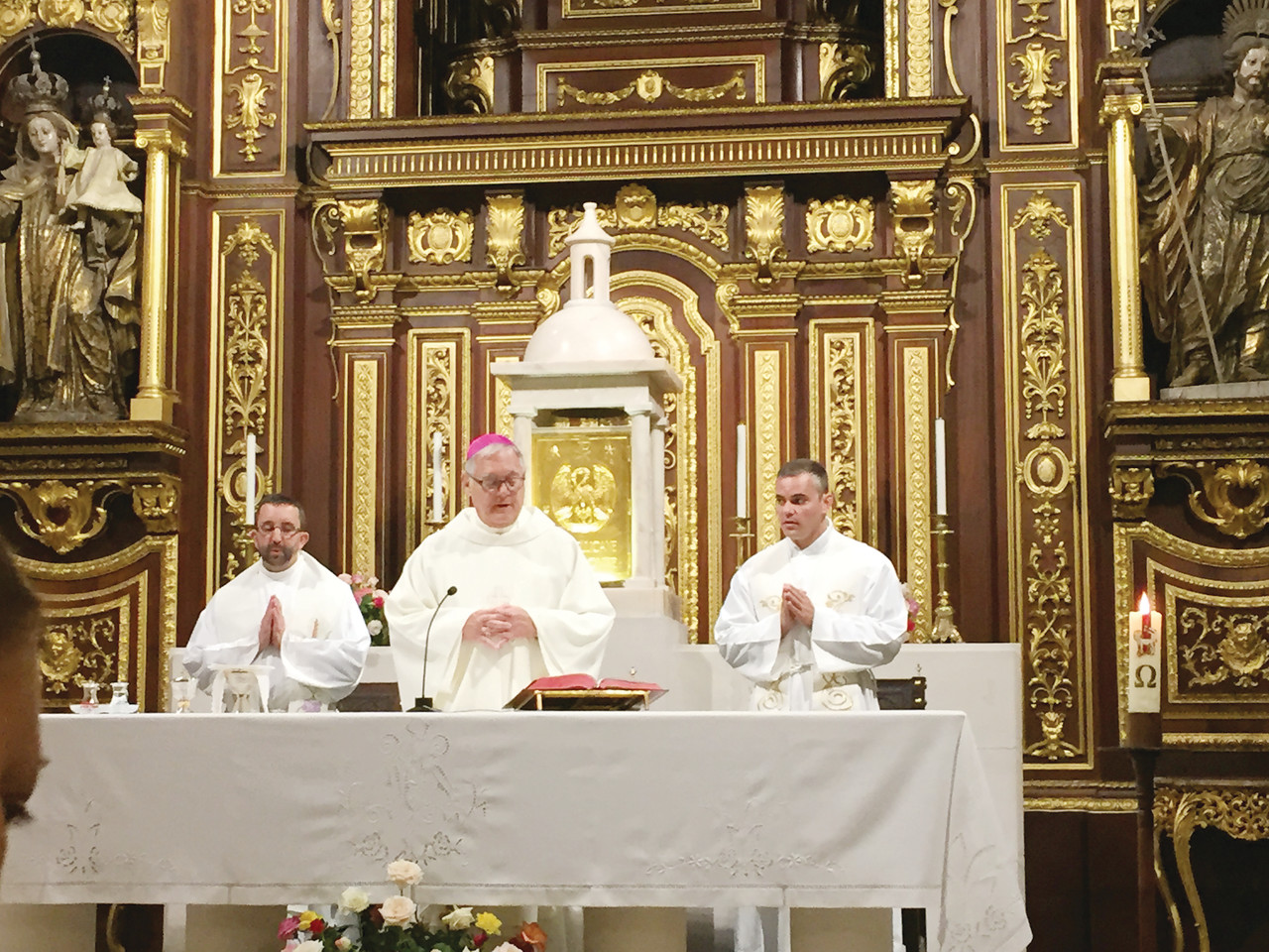 Bishop Thomas J. Tobin concelebrates Mass with Father Carl Fisette, at left, and Father Rodrigues, at right, at the Carmelite monastery where Sister Lúcia spent her last years on earth. Sister Lúcia who including her cousins, Jacinta and Francisco Marto, witnessed Marian apparitions in Fatima in 1917.