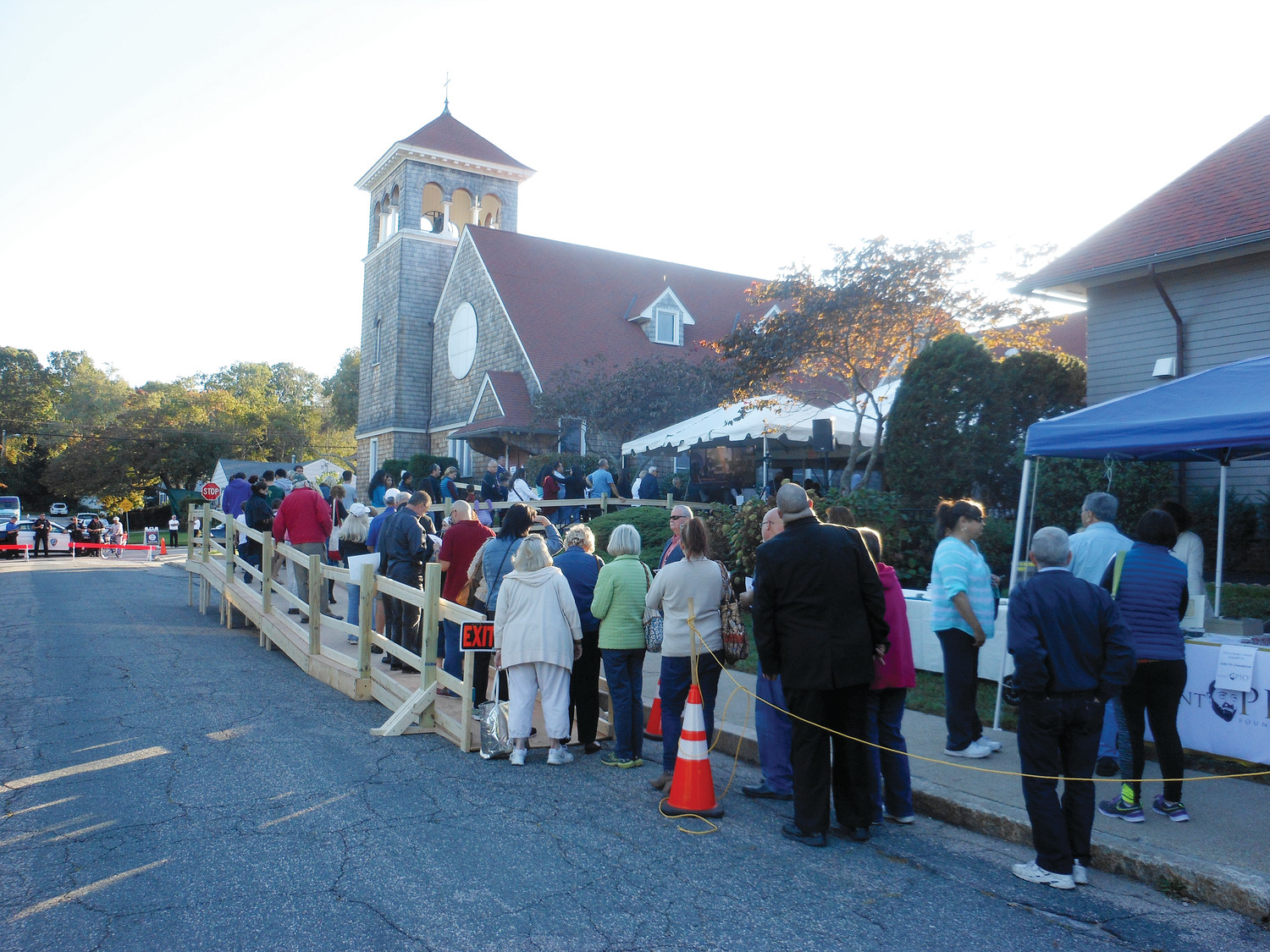 Crowds gather outside of St. Thomas More Church in Narragansett to venerate the relics of St. Padre Pio.