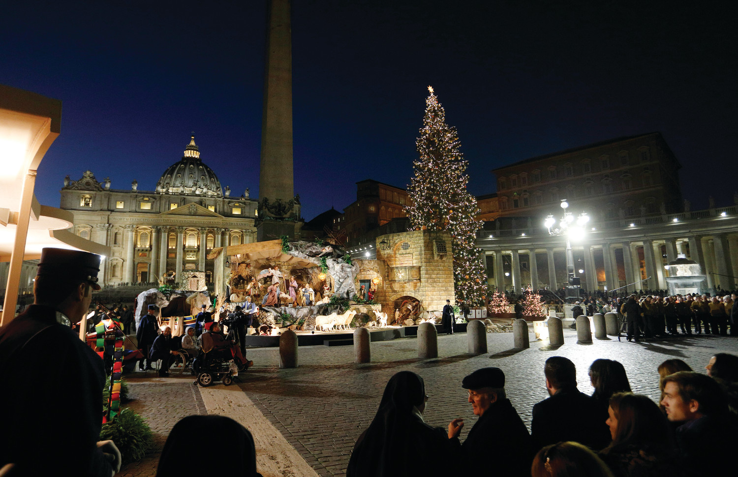 The Christmas tree and Nativity scene are pictured in St. Peter's Square after a lighting ceremony at the Vatican Dec. 9, 2016.