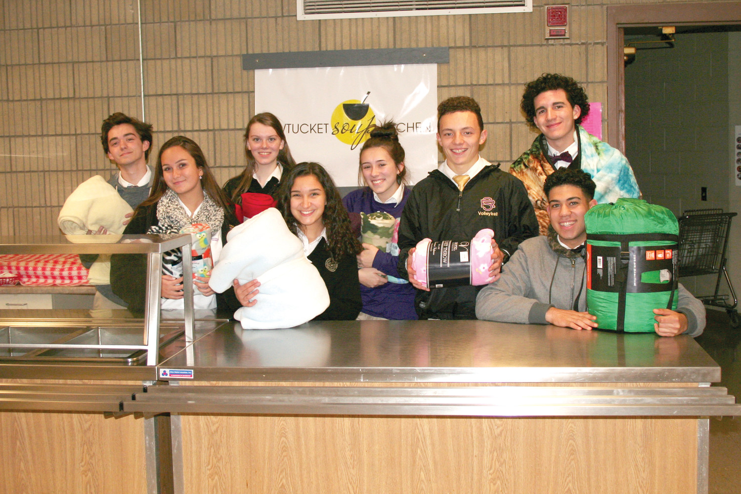 Pictured, from left to right, Kaylem Pereira, Gianna Medeiros, Anna-Marie Ferris, Theresa Wagner, Emily Gaboriault, Eric Martineau, Billy Baxter-Lima and Kelvin Torres, seated right.