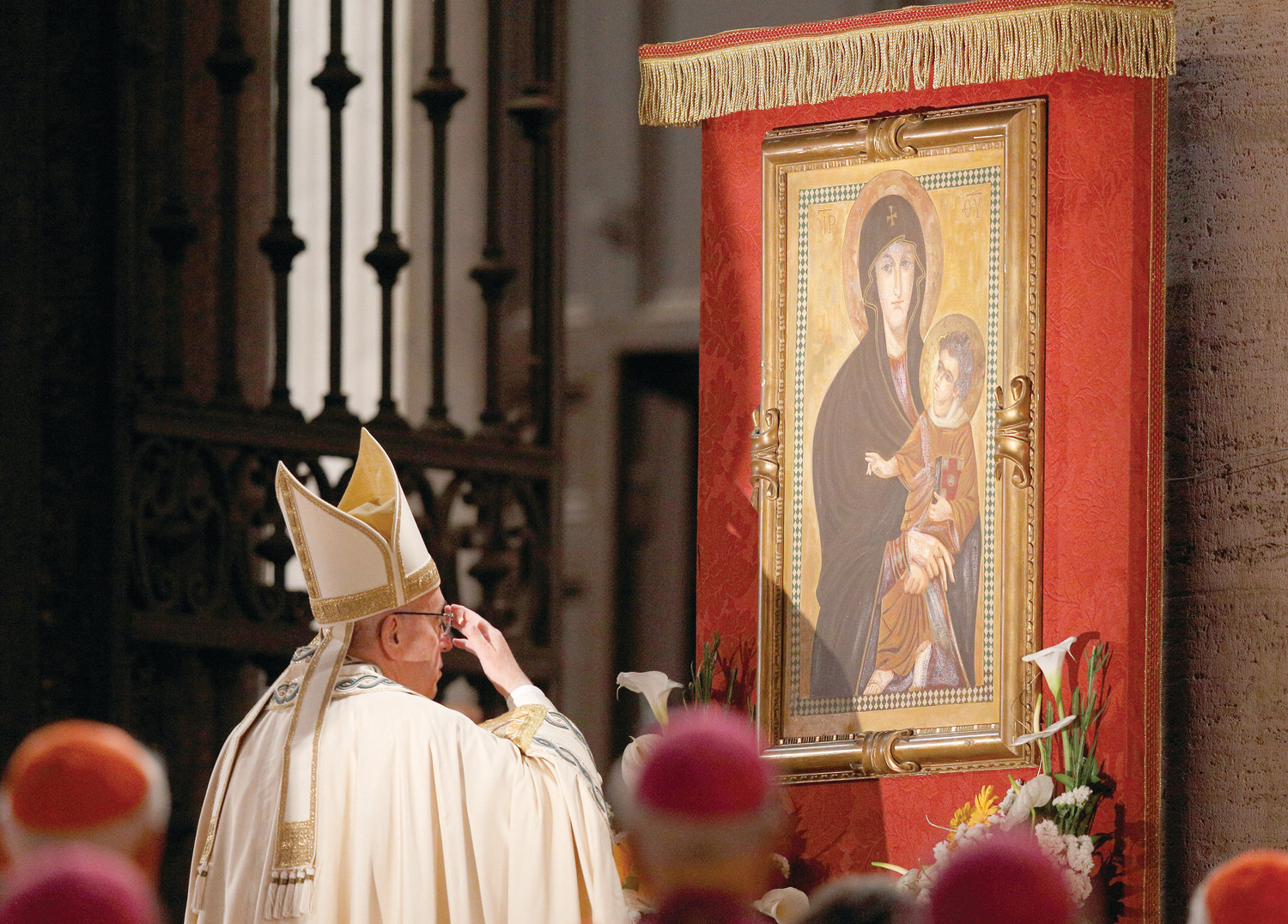 Pope Francis venerates a Marian image outside the Basilica of St. Mary Major in Rome in this May 26, 2016, file photo. The pope has instituted a new Marian feast honoring Mary as mother of the church. It will be celebrated every year on the Monday after Pentecost.