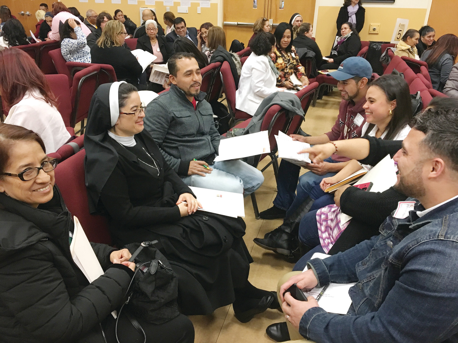 Delegates share their stories and ideas during one of two sessions at the La Salette Shrine.