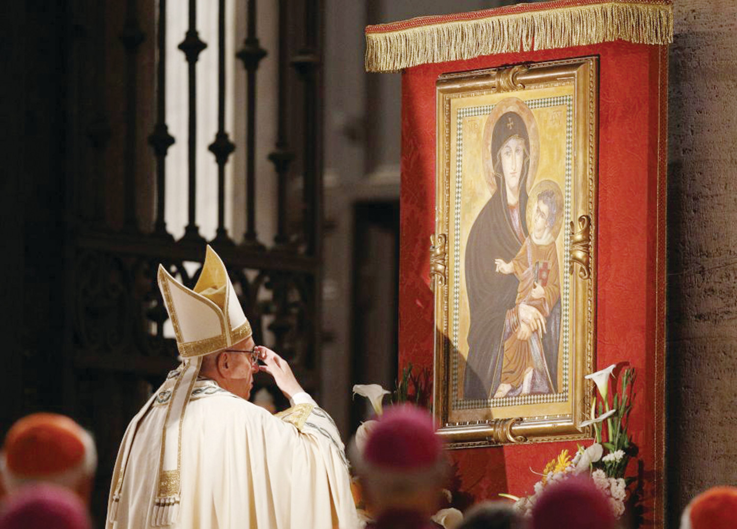 Pope Francis venerates a Marian image outside the Basilica of St. Mary Major in Rome in this May 26, 2016, file photo.