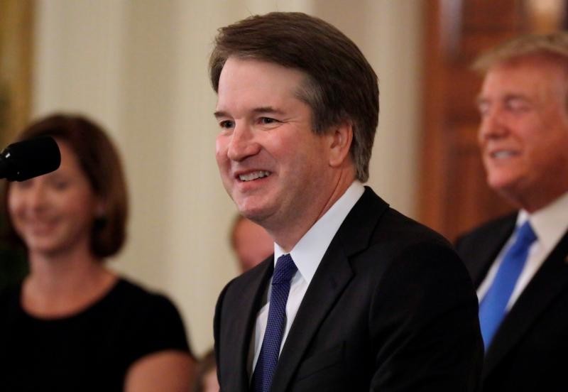 Brett Kavanaugh, a Catholic, who is a judge on the U.S. Court of Appeals for the District of Columbia Circuit, smiles July 9 at the White House in Washington after President Donald Trump named him his Supreme Court nominee