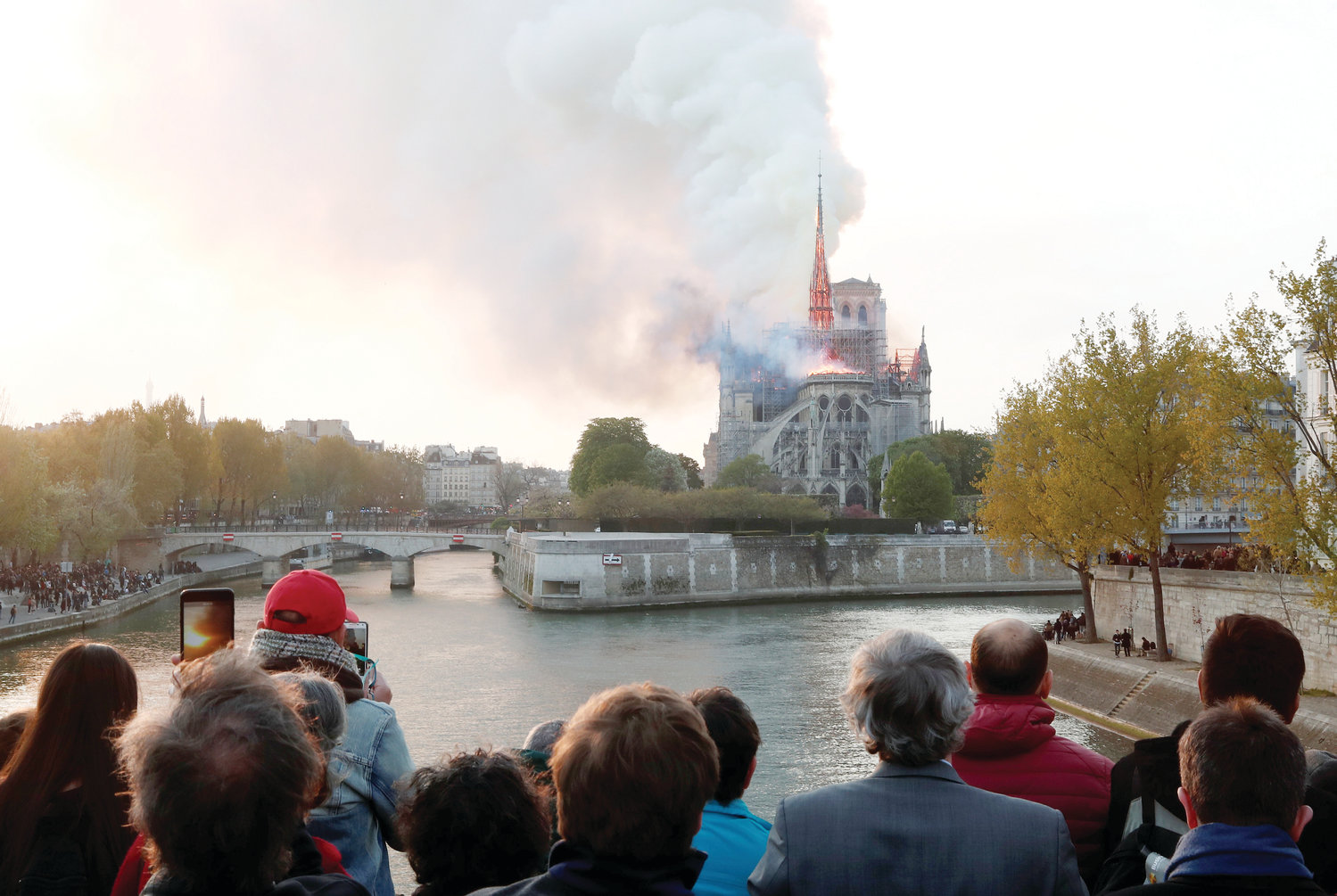 Flames and smoke billow from the Notre Dame Cathedral after a fire broke out in Paris April 15, 2019. Officials said the cause was not clear, but that the fire could be linked to renovation work.