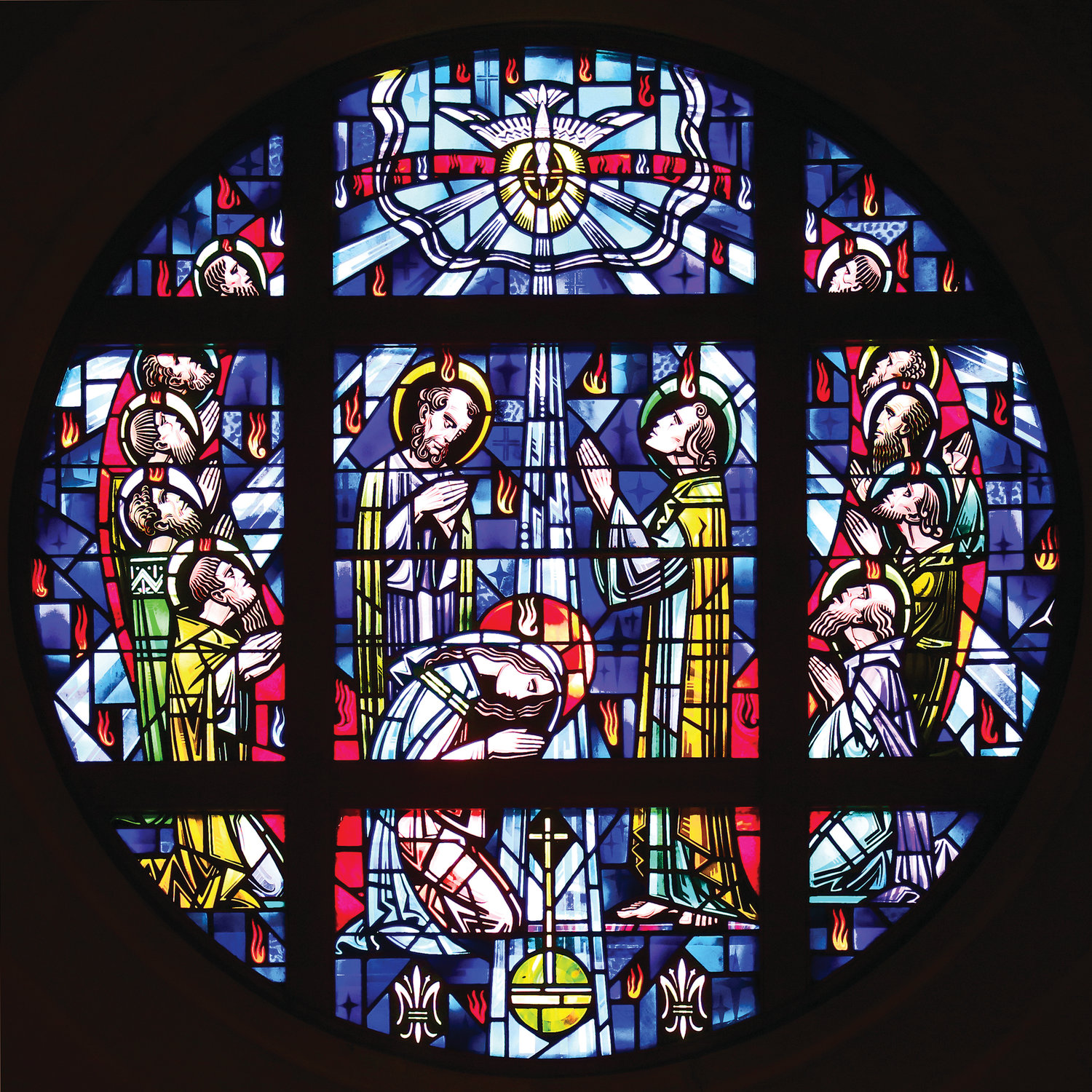 A scene from Pentecost is depicted in a stained-glass window in Queen of Apostles Chapel at the Maryknoll Society Center in Maryknoll, N.Y.