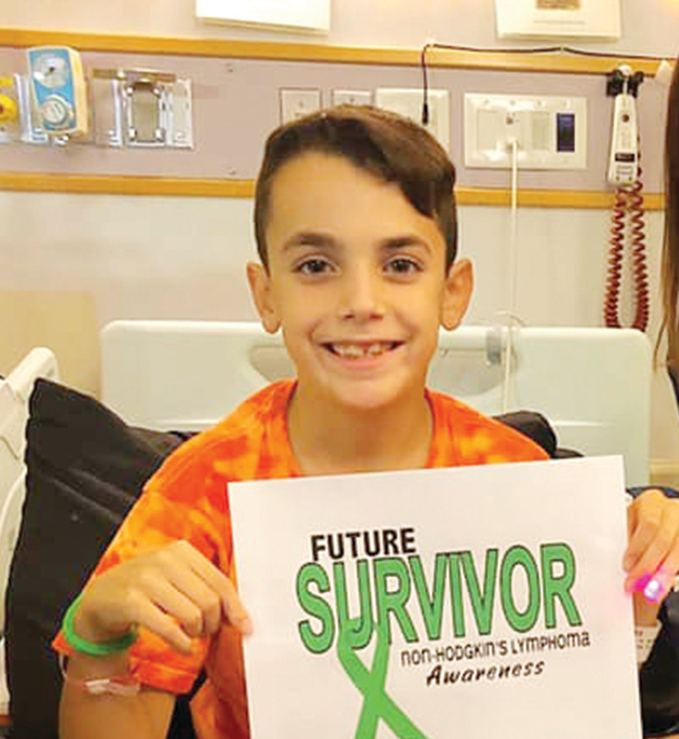 A prayer service was held last week for Noah Antunes, 10, parishioner of St. Michael Church, Smithfield, who is battling Burkitt Lymphoma. The community has come together to show their loving support for Noah.