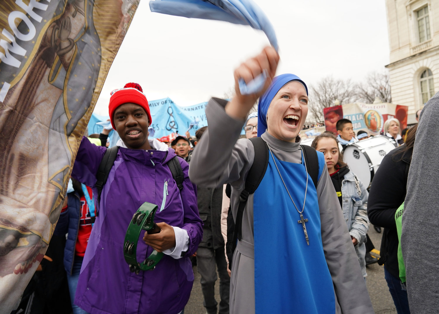 A religious sister sings and waves a cloth while participating in the 47th annual March for Life in Washington Jan. 24, 2020.