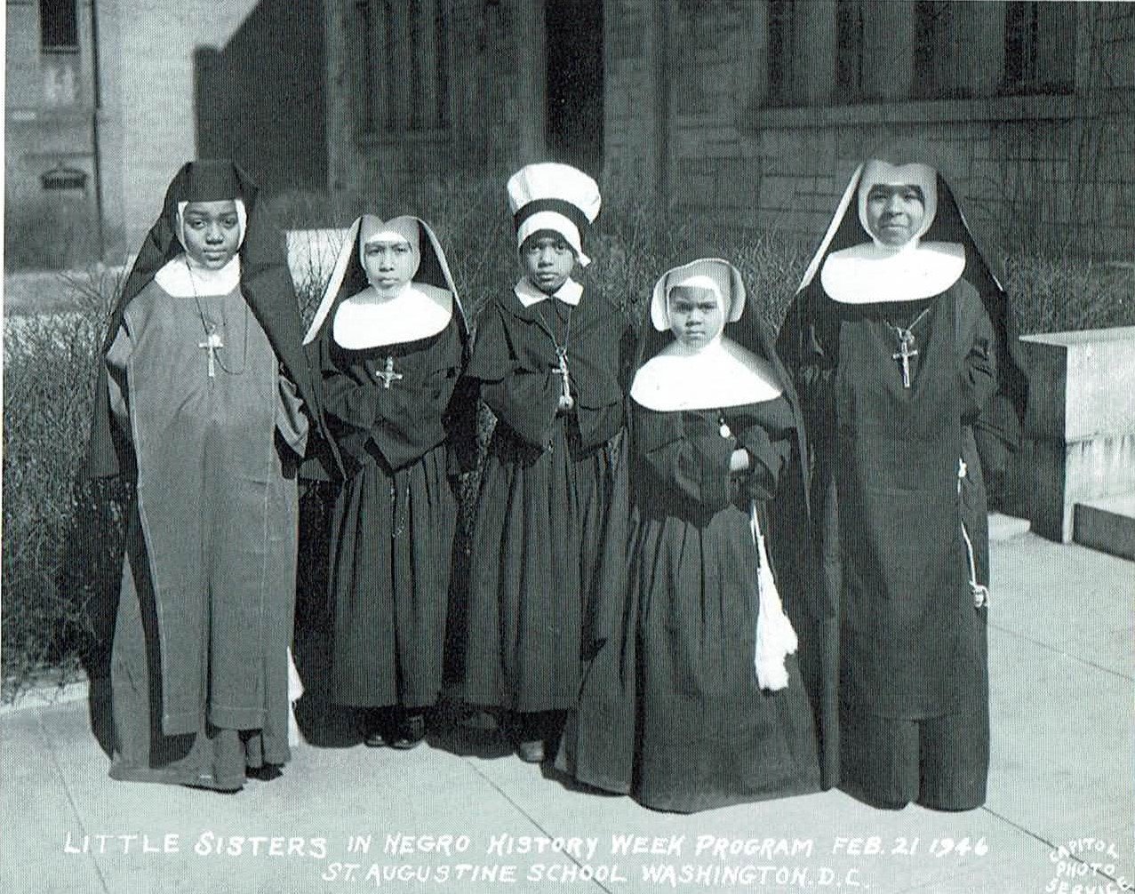 In this Feb. 21, 1946, file photo, students at St. Augustine School in Washington, led by the Oblate Sisters of Providence, participate in Negro History Week; the precursor to Black History Month, observed each February.