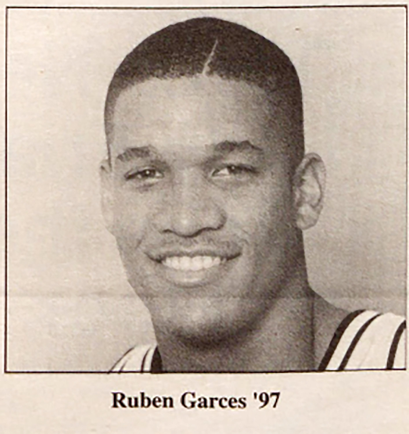 A photo from the October 12, 1995, March Madness edition of “The Cowl,” the student newspaper for the Providence College campus. In an article from the same edition, the 6’9” center discussed his dedication to the team and making his school work a priority. “I’m not the kind of guy that goes out a lot…I came here to get something done. I didn’t come here to party or go out a lot. I came here to play ball and finish my schooling. I like to study. That’s why I came here, because I knew if I did my best I can graduate from here.”