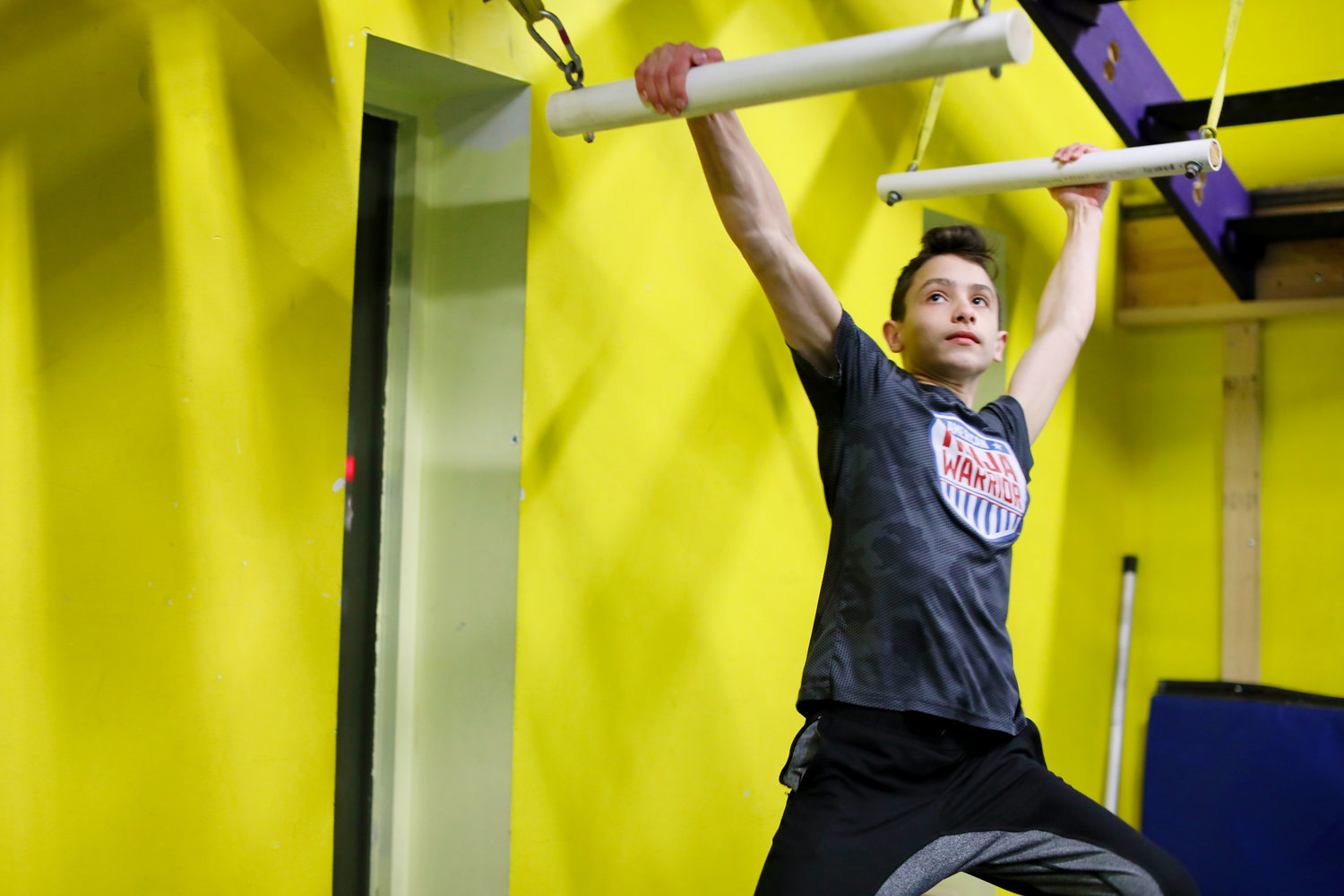 Carson Dean, 13, trains at his at his gym Laid-back Fitness in Warwick.