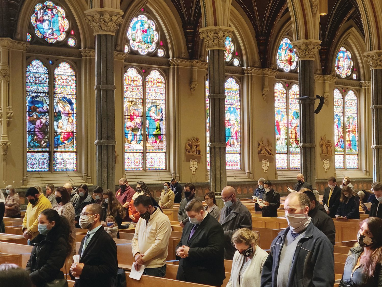 Catechumens and candidates, along with their sponsors, take part in the Rite of Election, which was held on Feb. 21 at the Cathedral of Saints Peter and Paul.