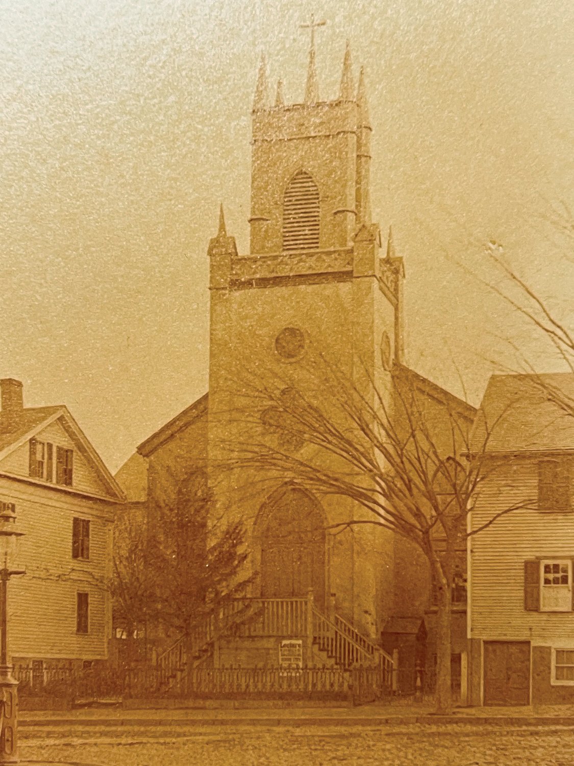 A rare view of the original Church of SS. Peter and Paul, one of the early stone churches built in Providence, where Mass was first celebrated on March 10, 1837. The cornerstone was laid on the site 41 years later, on Nov. 28, 1878, for the current Cathedral of SS. Peter and Paul.
