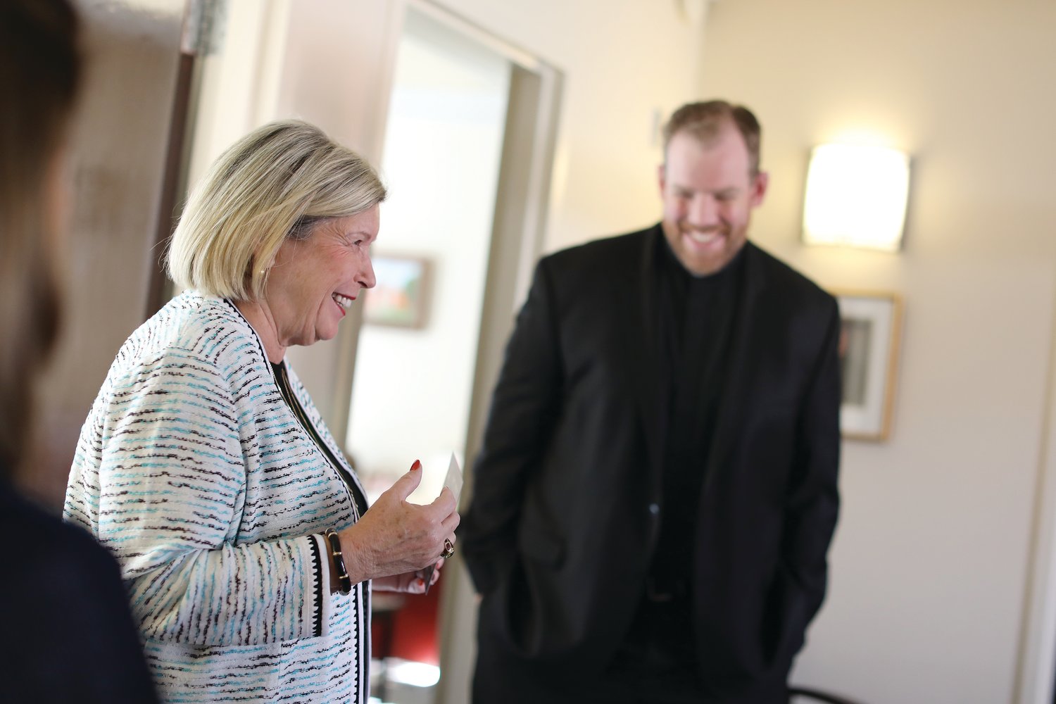 During a special tour of Our Lady of Providence Seminary, Barbara Papitto meets with Father Brian Morris, director of vocations, pictured, and Father Christopher Murphy, rector. Papitto has established a $1 million endowment grant with the Catholic Foundation of Rhode Island to support priestly formation.