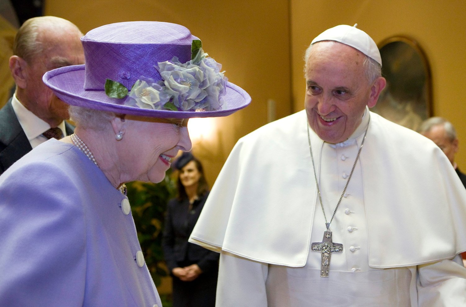 Britain's Queen Elizabeth II talks with Pope Francis during a meeting at the Vatican in this April 3, 2014, file photo. Queen Elizabeth died Sept. 8, 2022, at the age of 96.